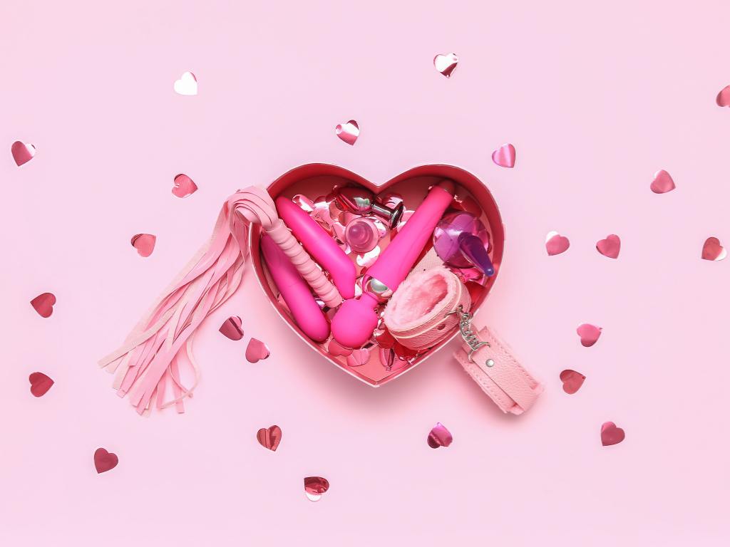 Vários sex toys dentro de caixa de presente